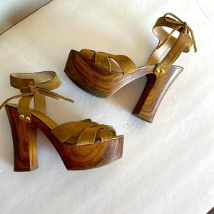 GUESS wooden high heel shoes.